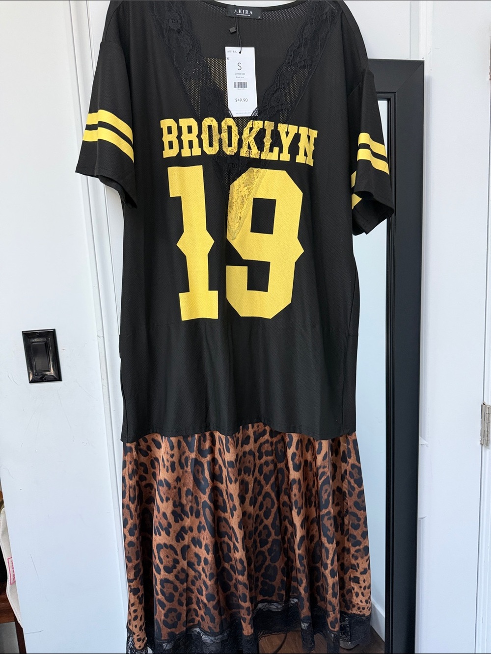 AKIRA Black & Yellow Brooklyn Graphic Dress with Leopard Hem
